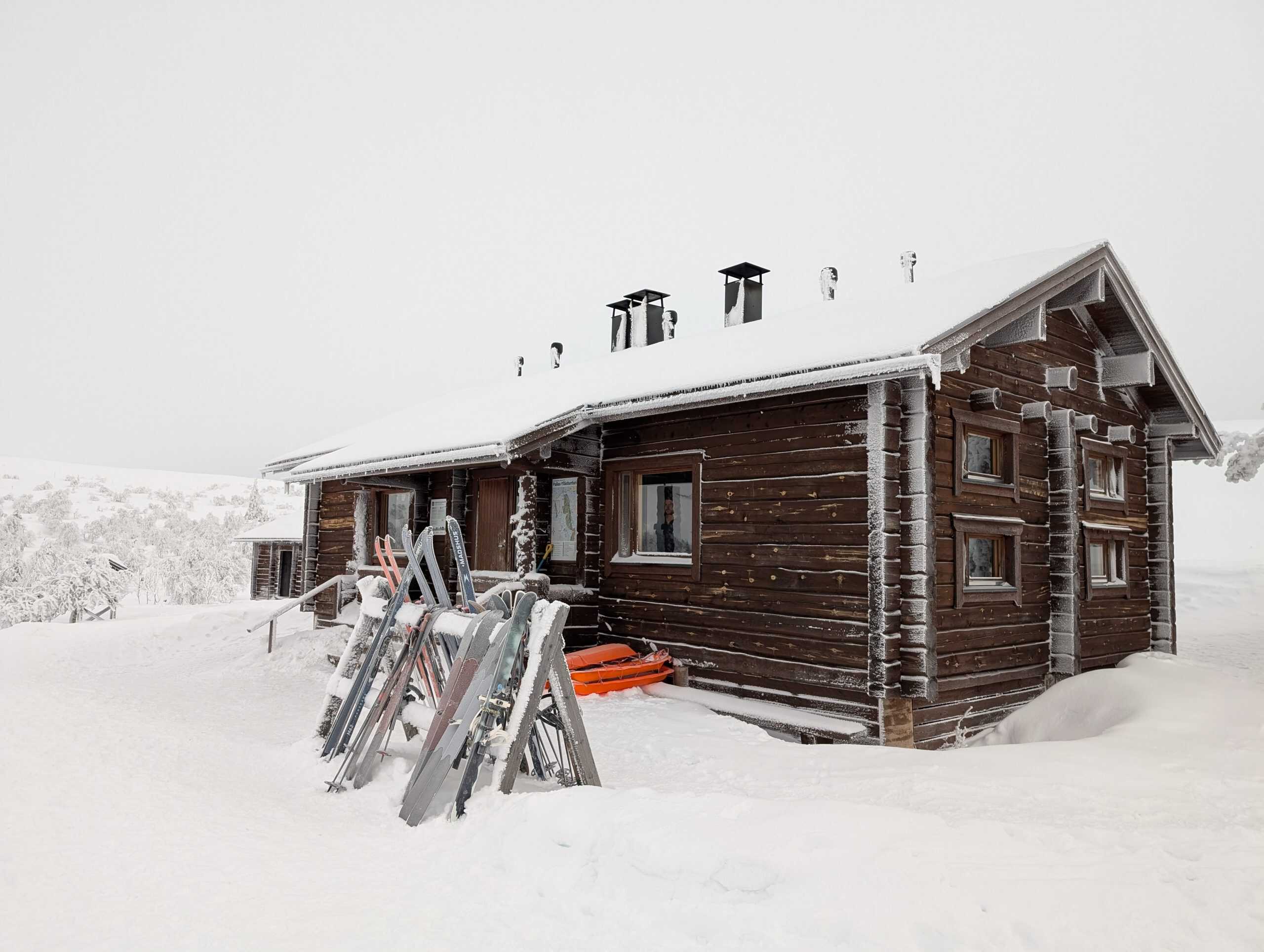 Wilderness cabin under a Lapland sky